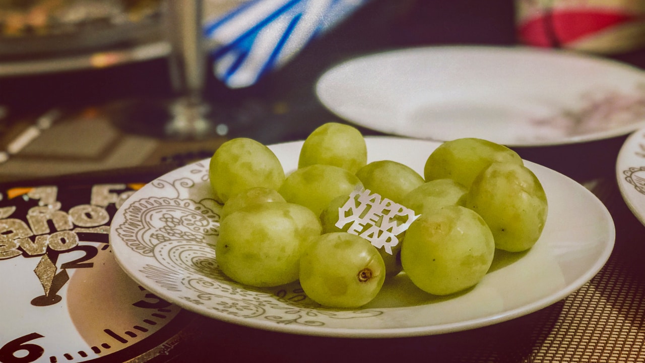 8 Latino Traditions You Need To Recreate To Ring In the New Year Con Buenas Vibras