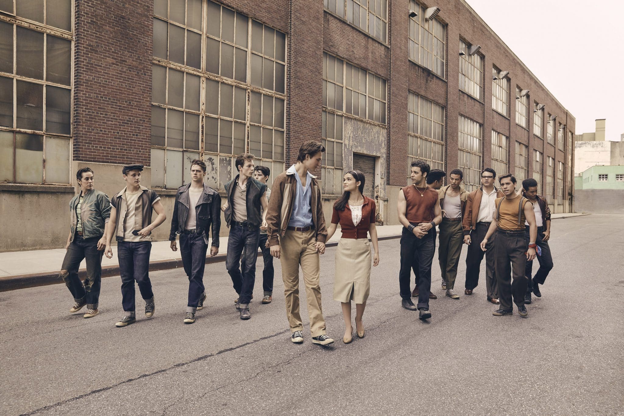 © 2020 Twentieth Century Fox Film Corporation.  All Rights Reserved. Photo by Ramona Rosales. (Left to Right:) Anybodys (Ezra Menas), Mouthpiece (Ben Cook), Action (Sean Harrison Jones); Jets leader Riff (Mike Faist); Baby John (Patrick Higgins); Tony (Ansel Elgort) and Maria (Rachel Zegler); Maria’s brother and Sharks leader Bernardo (David Alvarez); and Sharks members Quique (Julius Anthony Rubio), Chago (Ricardo Zayas), Chino (Josh Andrés Rivera), Braulio (Sebastian Serra) and Pipo (Carlos Sánchez Falú).