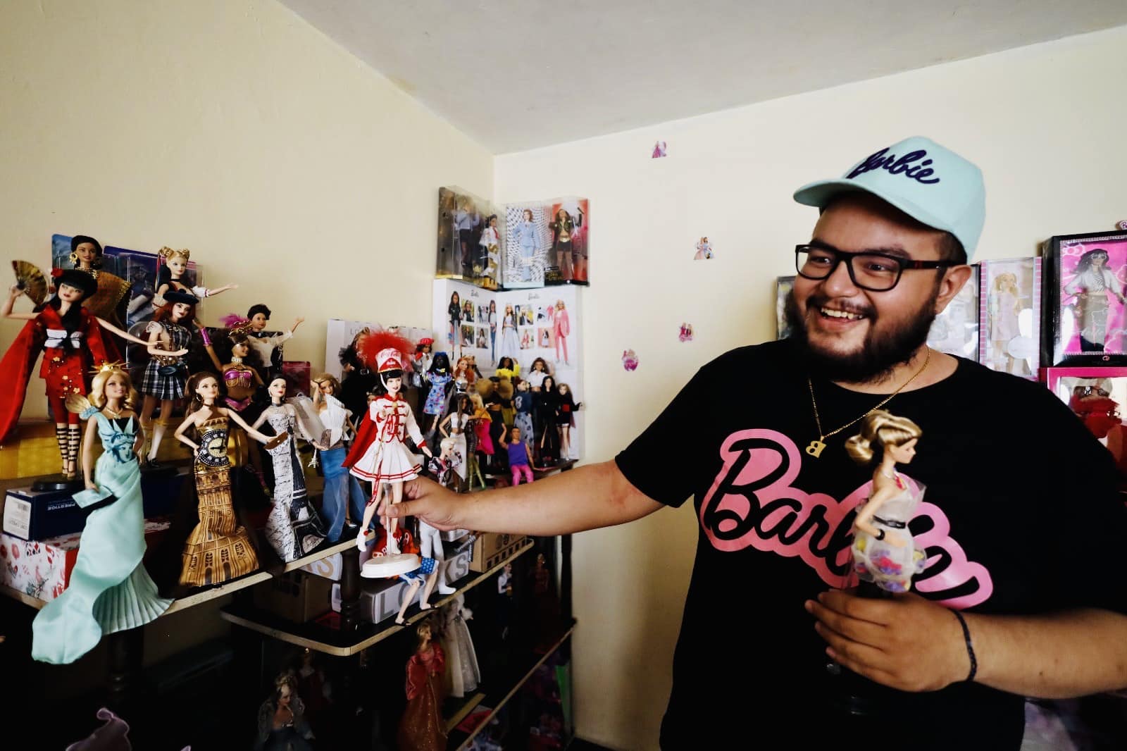 Dr. Paul Sebastian Juarez Velasquez and his prized Barbie collection.