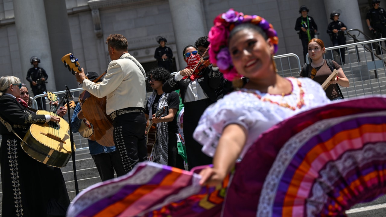 Latinos Are Leaning Into Art, Community, and Collective Action As Protests Against Immigration Raids Continue