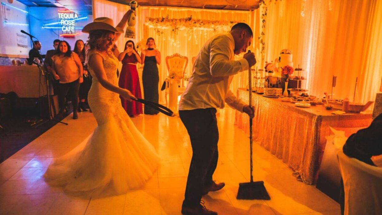 Why Your Tío Is Dancing Around With a Broom, and Other Latino Wedding Traditions Explained